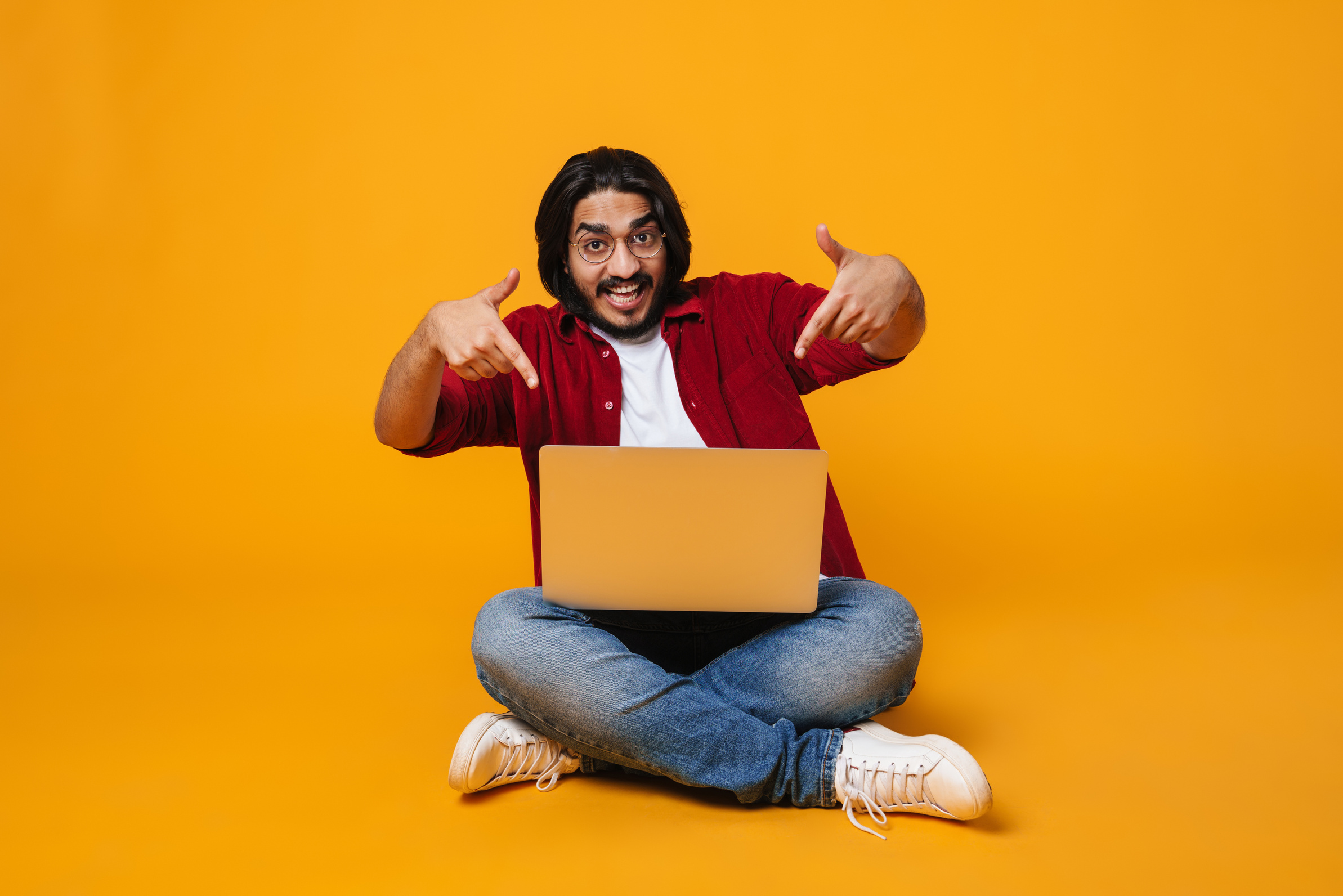 Happy Indian Man Using Laptop Computer Isolated