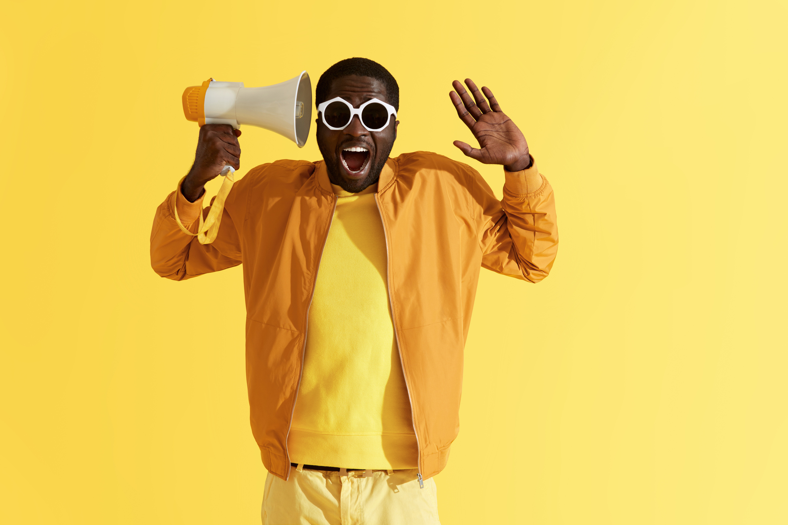 Man Holding Megaphones